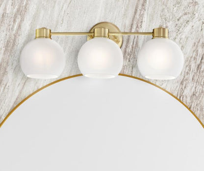 Dorney Three-Light Wall Fixture: Champagne Brass Finish