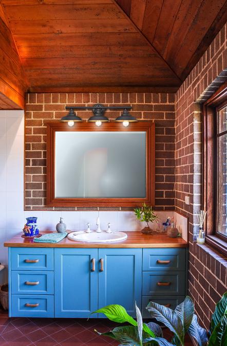 Iron Hill Three-Light Indoor Wall Fixture: Oil Rubbed Bronze Finish with Highlights and Metallic Bronze Interior